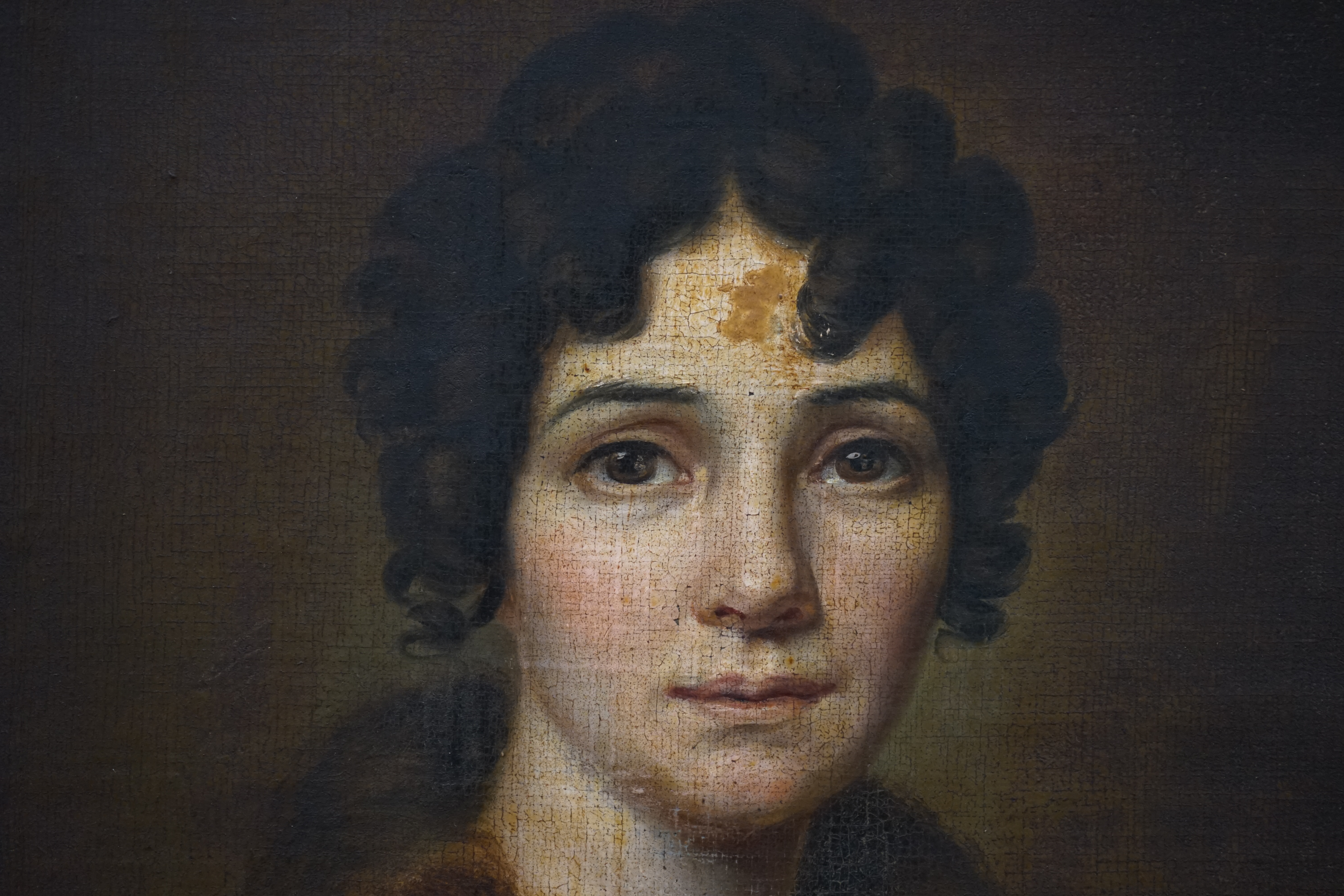 Oil on board, Portrait of a Regency lady, unsigned, 30 x 25cm, gilt framed. Condition - fair, some losses to the frame